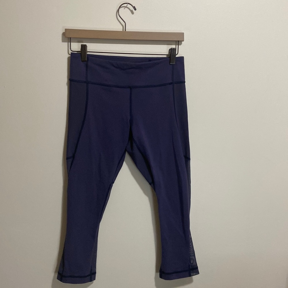 Lululemon Woman’s Yoga Capri size 6  plum color .